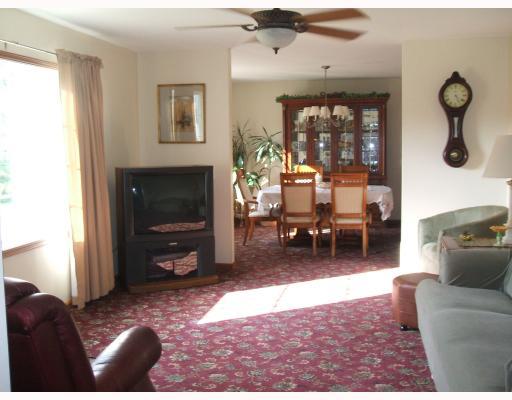 403 Parker Road Sarver, PA 16055 - Photo 8 of 18 Living Room. Extra wide doorways into livingroom with lighted ceiling fan into the dining area. Spacious, light and bright spaces.