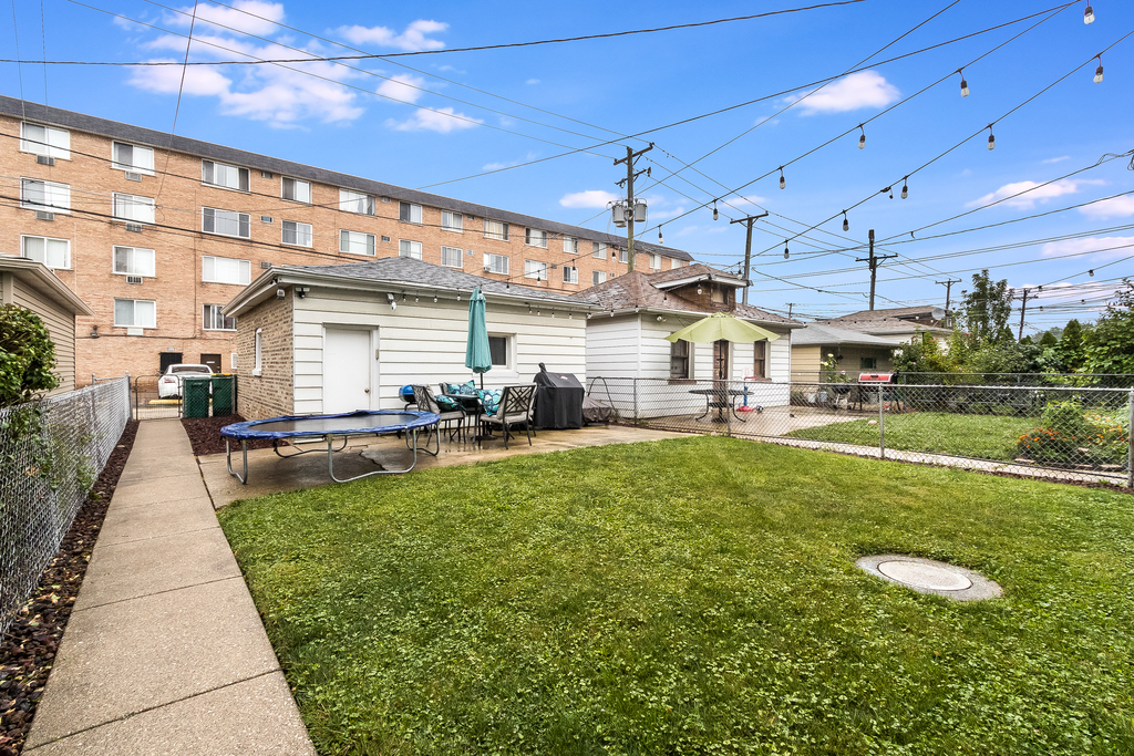 1234 Maple Avenue Berwyn, IL 60402 - Photo 25 of 25 a view of a swimming pool with a patio
