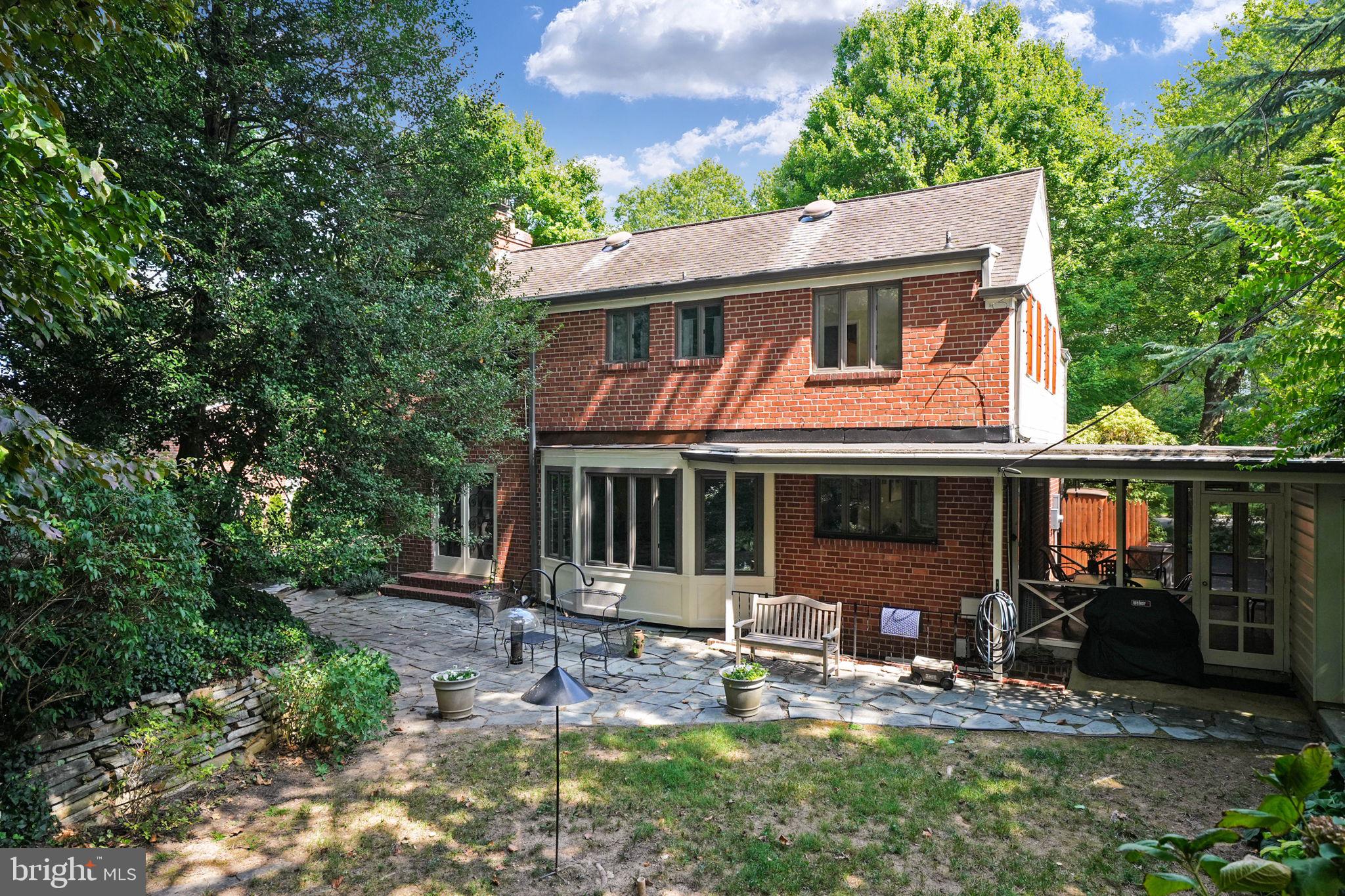 207 Buxton Road Falls Church, VA 22046 - Photo 36 of 42 Back view of dining room, screen porch and patio.