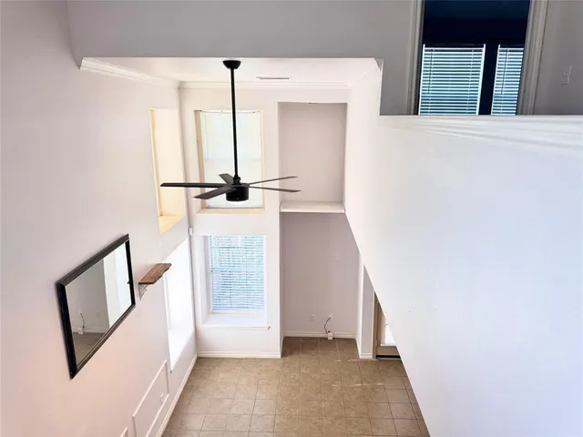 a view of a hallway with front door