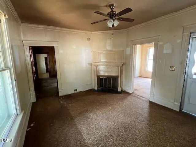 wooden floor in an empty room with a fireplace