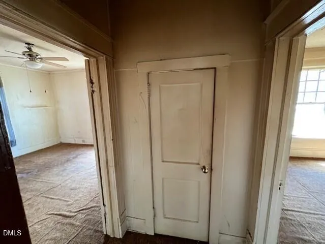 a view of an empty room and window