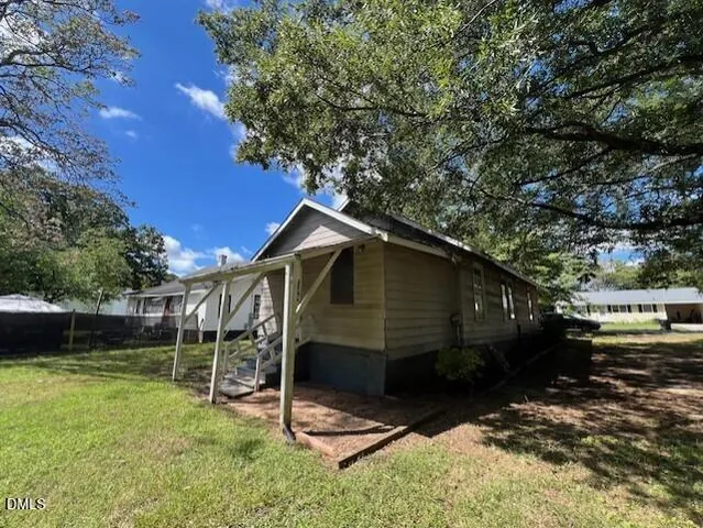 a view of backyard with green space