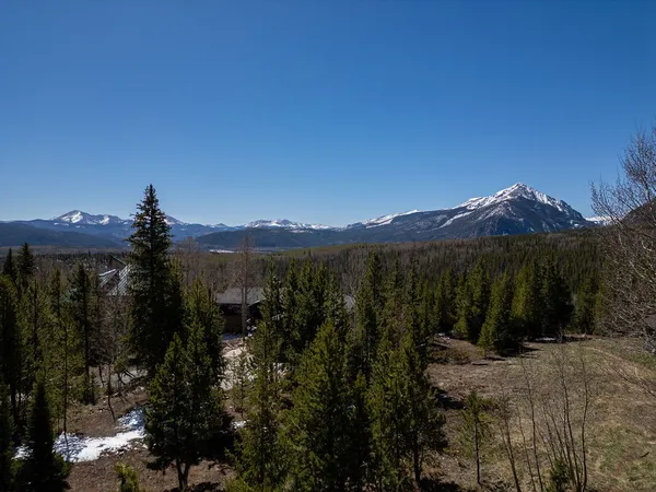 a view of a lake with a mountain in the background