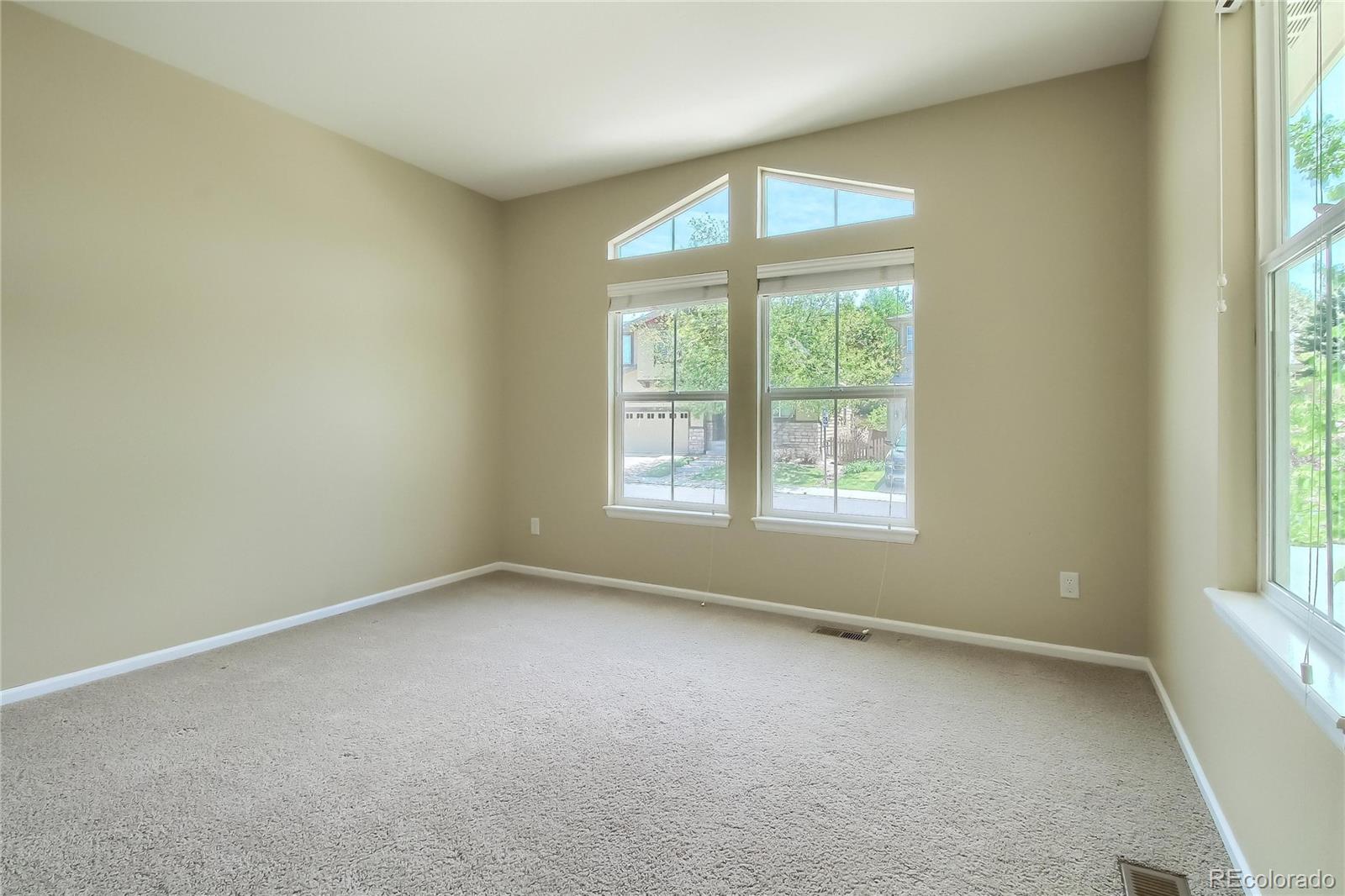 2705 Middlebury Drive Highlands Ranch, CO 80126 - Photo 11 of 40 an empty room with a window