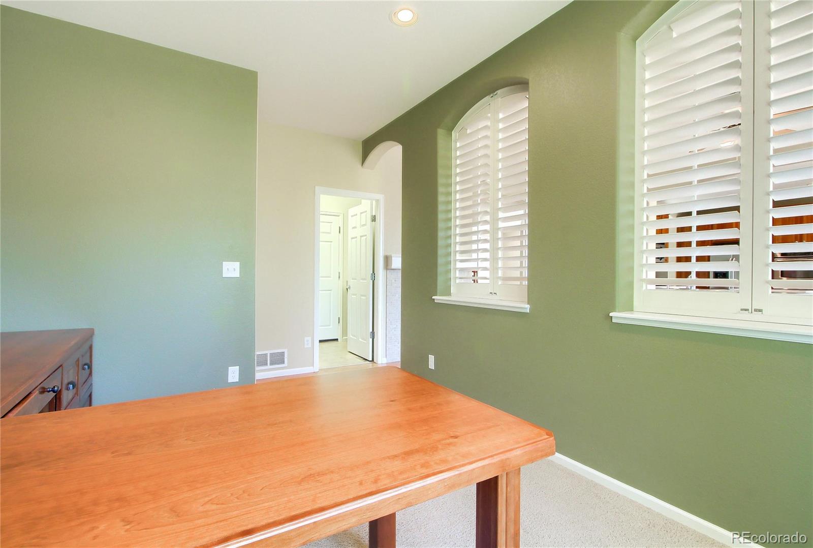 2705 Middlebury Drive Highlands Ranch, CO 80126 - Photo 16 of 40 a bedroom with a bed and a window