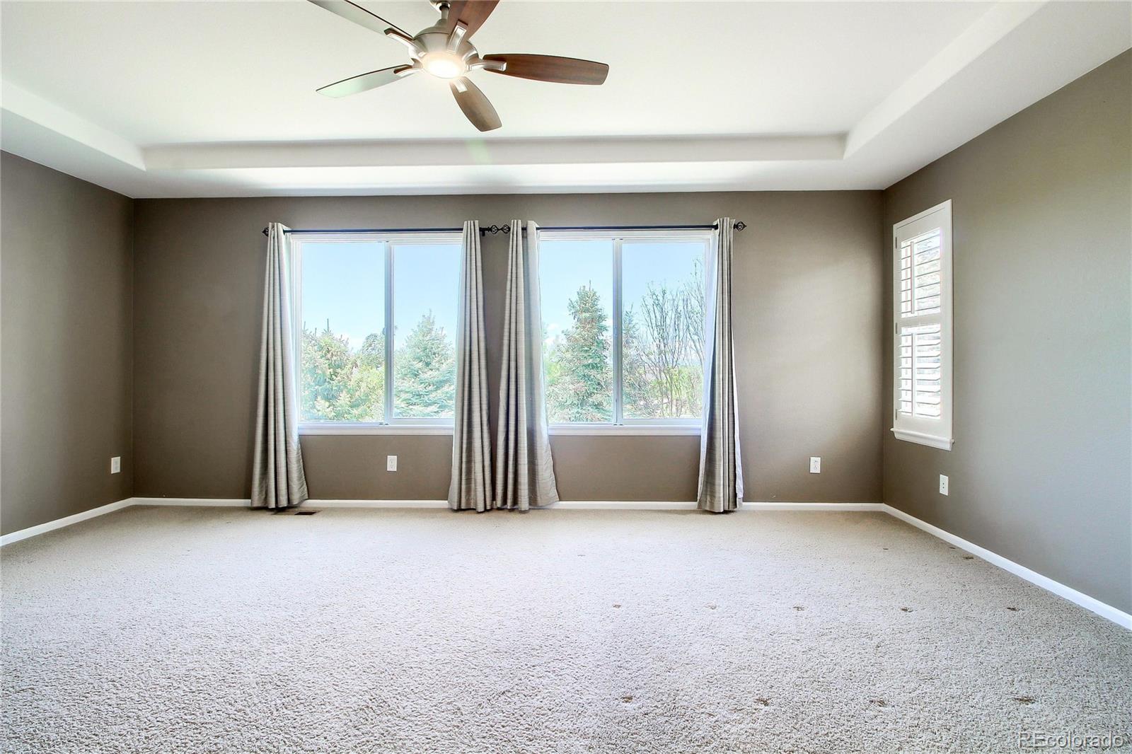 2705 Middlebury Drive Highlands Ranch, CO 80126 - Photo 22 of 40 a view of an empty room with a window