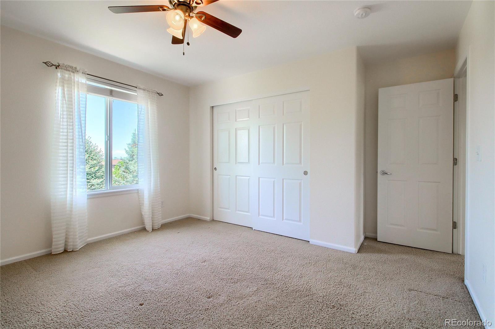 2705 Middlebury Drive Highlands Ranch, CO 80126 - Photo 25 of 40 a view of an empty room with a window