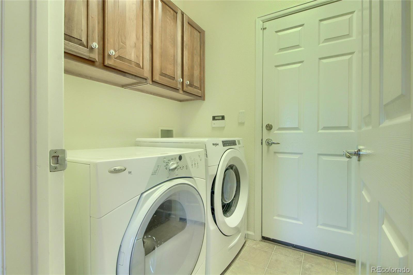 2705 Middlebury Drive Highlands Ranch, CO 80126 - Photo 27 of 40 a utility room with dryer and washer