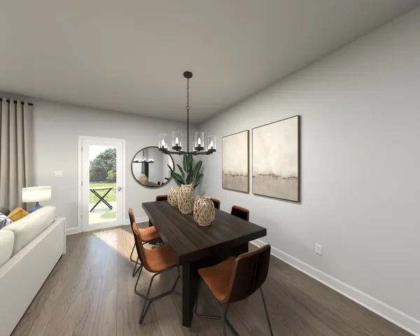 a view of a dining room with furniture wooden floor and chandelier