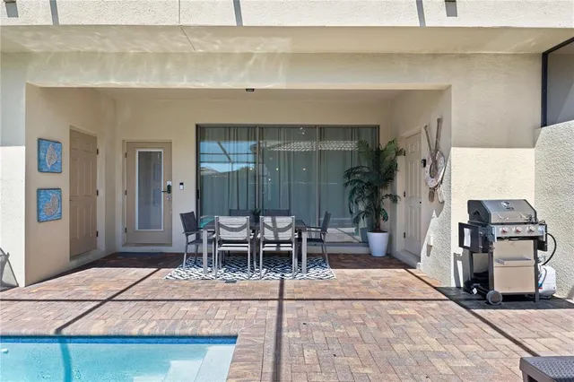 a spacious bedroom with a bed and a window