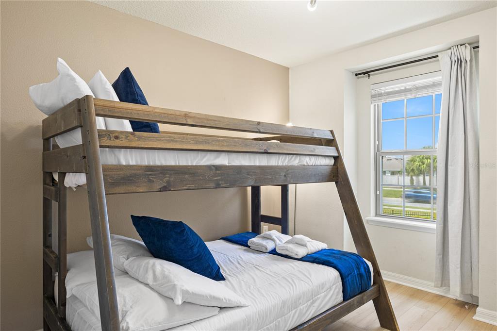 1905 Majorca Drive Kissimmee, FL 34747 - Photo 53 of 59 a bedroom with a bed and a window