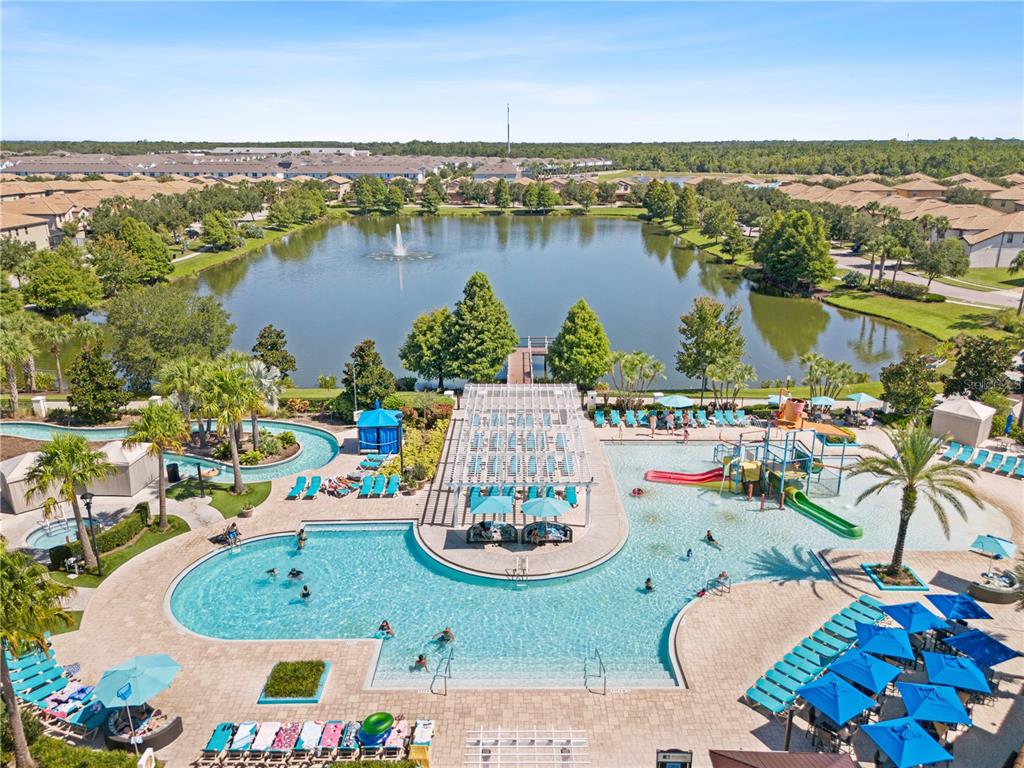 1905 Majorca Drive Kissimmee, FL 34747 - Photo 9 of 59 an aerial view of lake residential house with outdoor space and trees