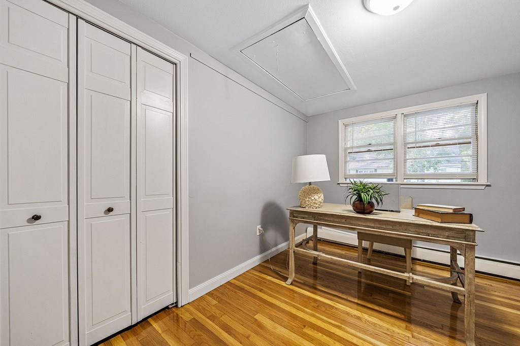 1075 Glebe Street Taunton, MA 02780 - Photo 13 of 31 a reading room with wooden floor and furniture