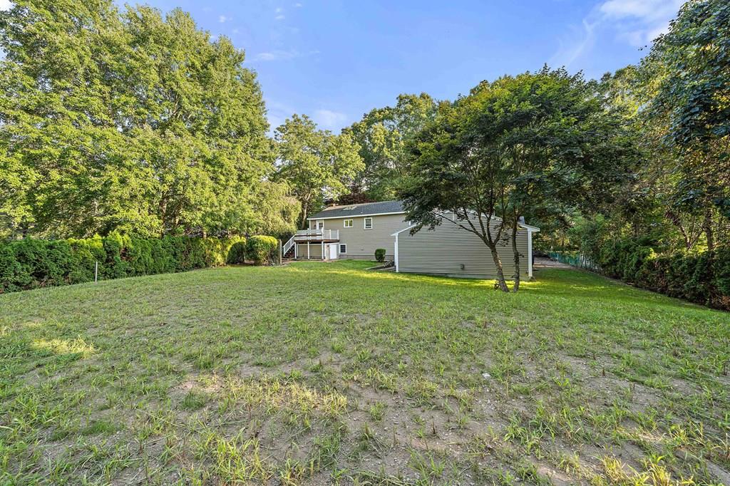 1075 Glebe Street Taunton, MA 02780 - Photo 26 of 31 a house view with a garden space