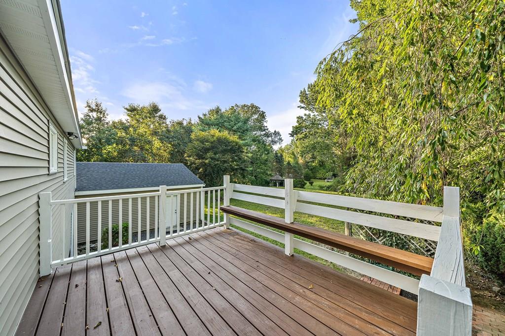 1075 Glebe Street Taunton, MA 02780 - Photo 29 of 31 a view of balcony with wooden floor and fence