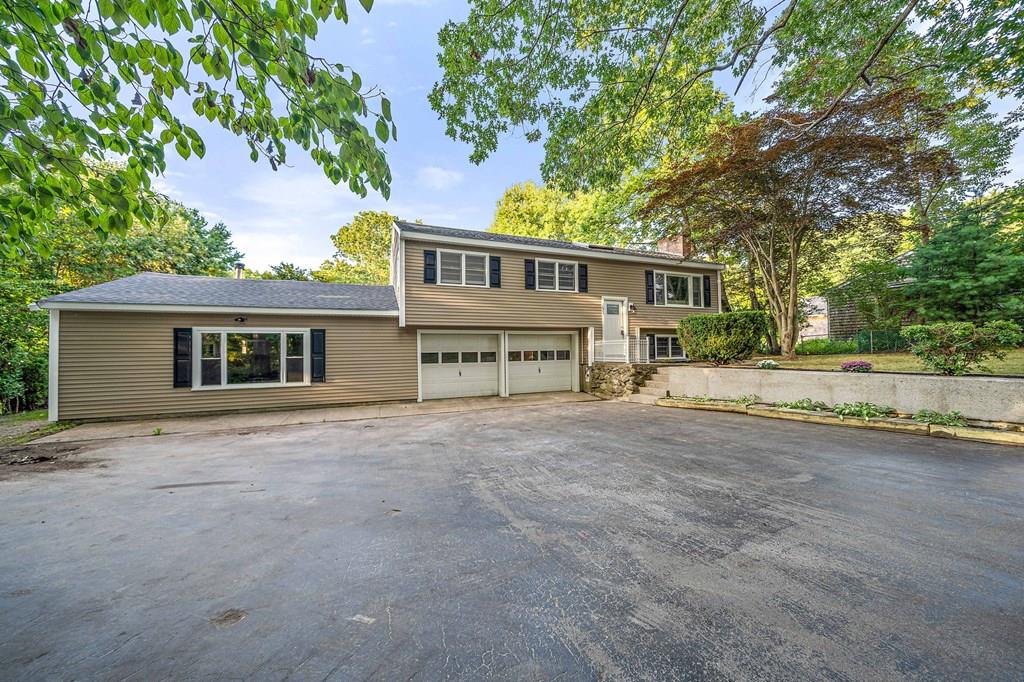 1075 Glebe Street Taunton, MA 02780 - Photo 31 of 31 front view of a house with a outdoor space