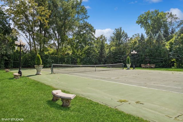 a very nice looking flowers with wooden floor
