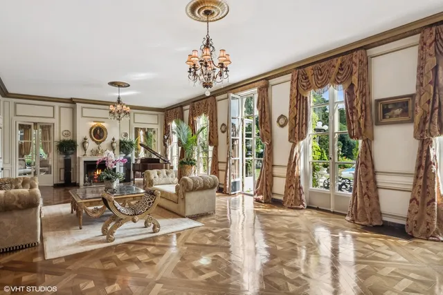 a backyard of a house with outdoor seating