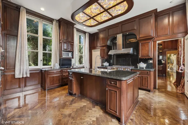 a bathroom with a bathtub and window