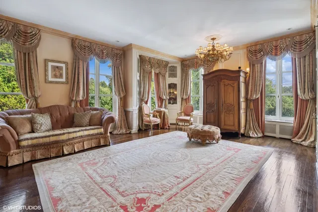 a view of a chair and table in the garden
