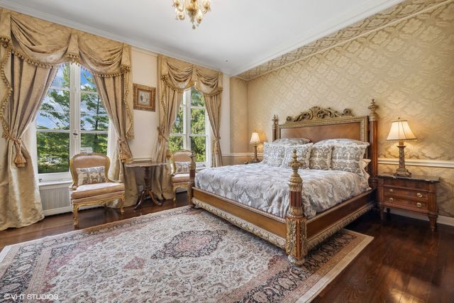 a view of a house with balcony and garden