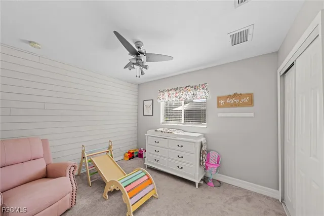 a room with furniture and white walls