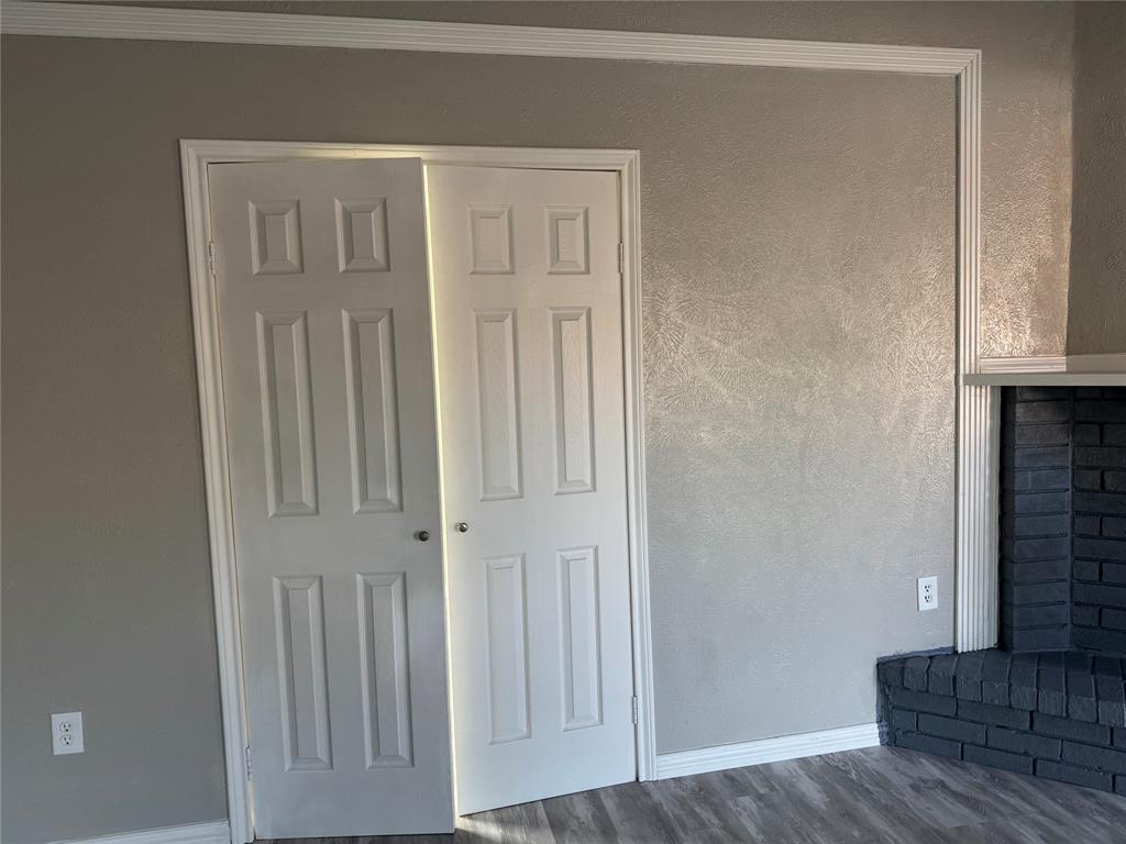 2125 Kings Road Carrollton, TX 75007 - Photo 9 of 33 a view of a livingroom with wooden floor