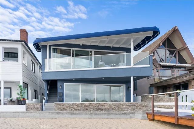 a front view of a house with a garage