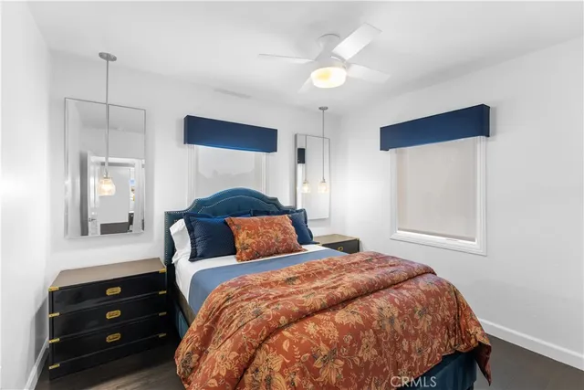 a bedroom with a bed and a closet