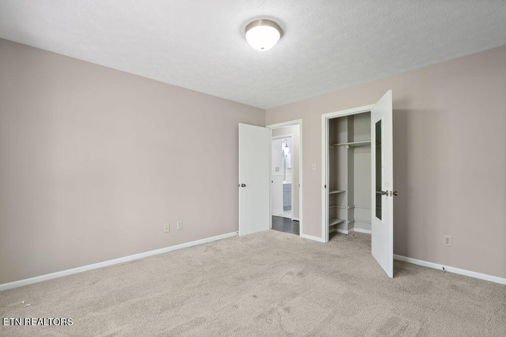 8908 Ellis Lane Powell, TN 37849 - Photo 13 of 37 an empty room with closet area and bathroom