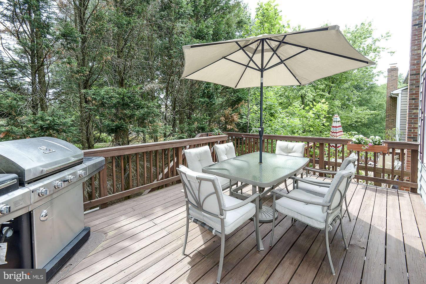 1510 Autumn Ridge Circle Reston, VA 20194 - Photo 14 of 16 a view of a patio on wooden deck and patio