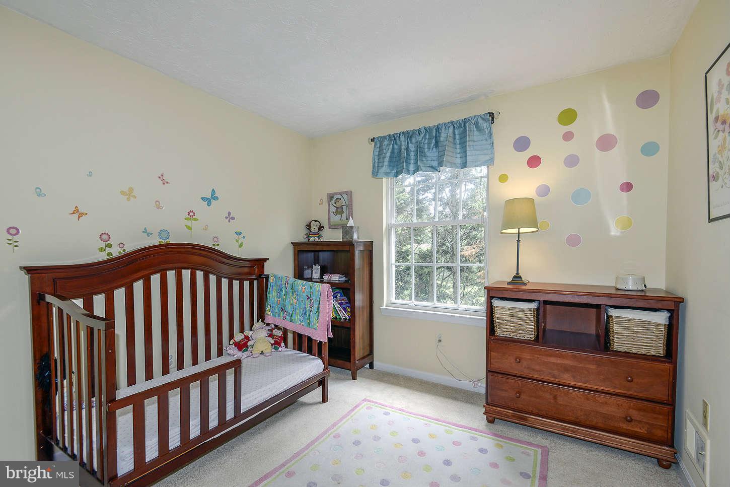 1510 Autumn Ridge Circle Reston, VA 20194 - Photo 10 of 16 a bedroom with furniture and a window