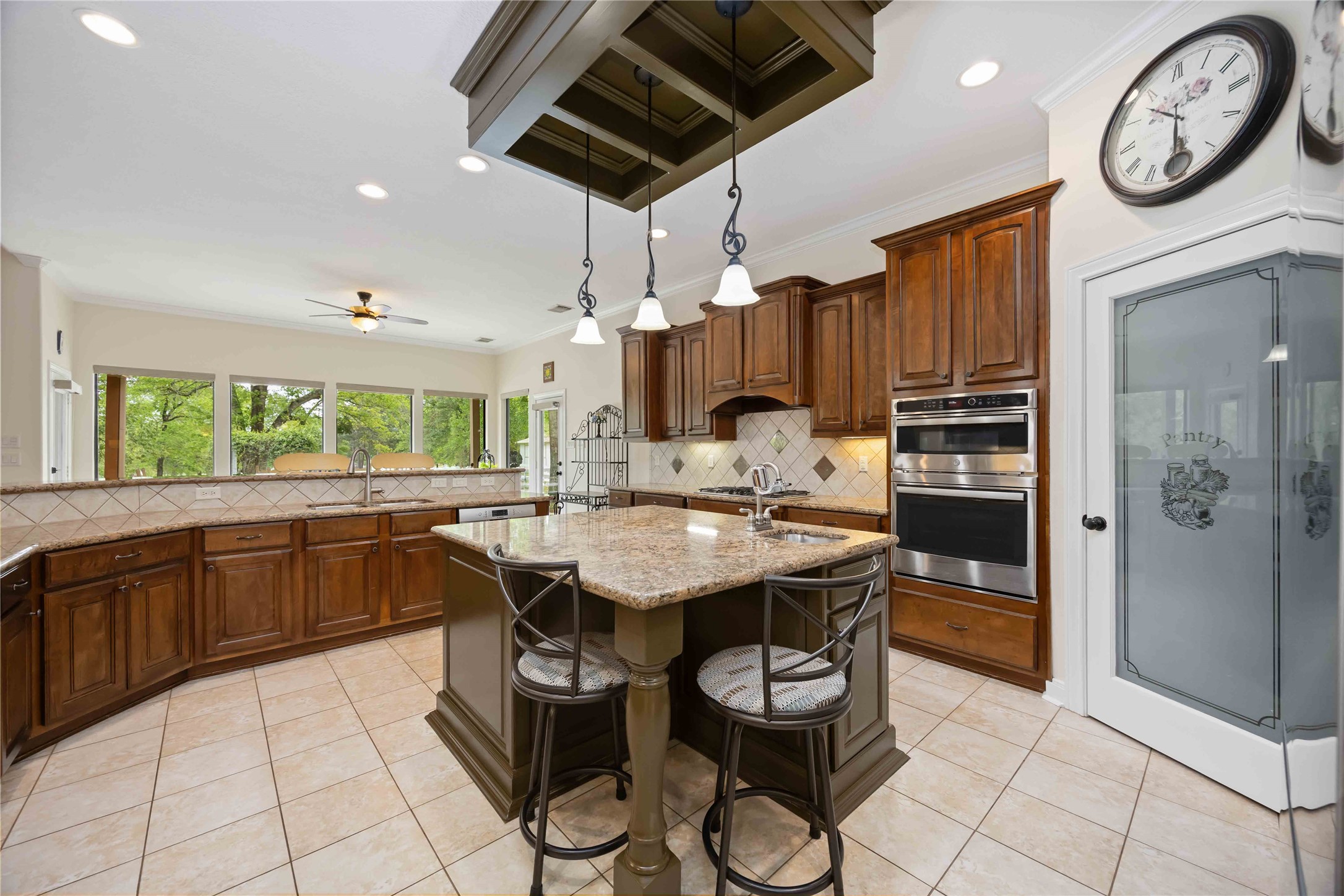1809 St Beulah Chapel Road Montgomery, TX 77316 - Photo 13 of 50 a kitchen with a sink a counter space appliances and cabinets