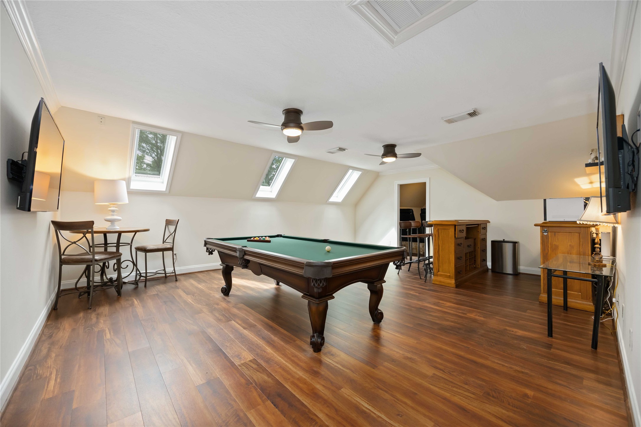 1809 St Beulah Chapel Road Montgomery, TX 77316 - Photo 29 of 50 a room with furniture and wooden floor