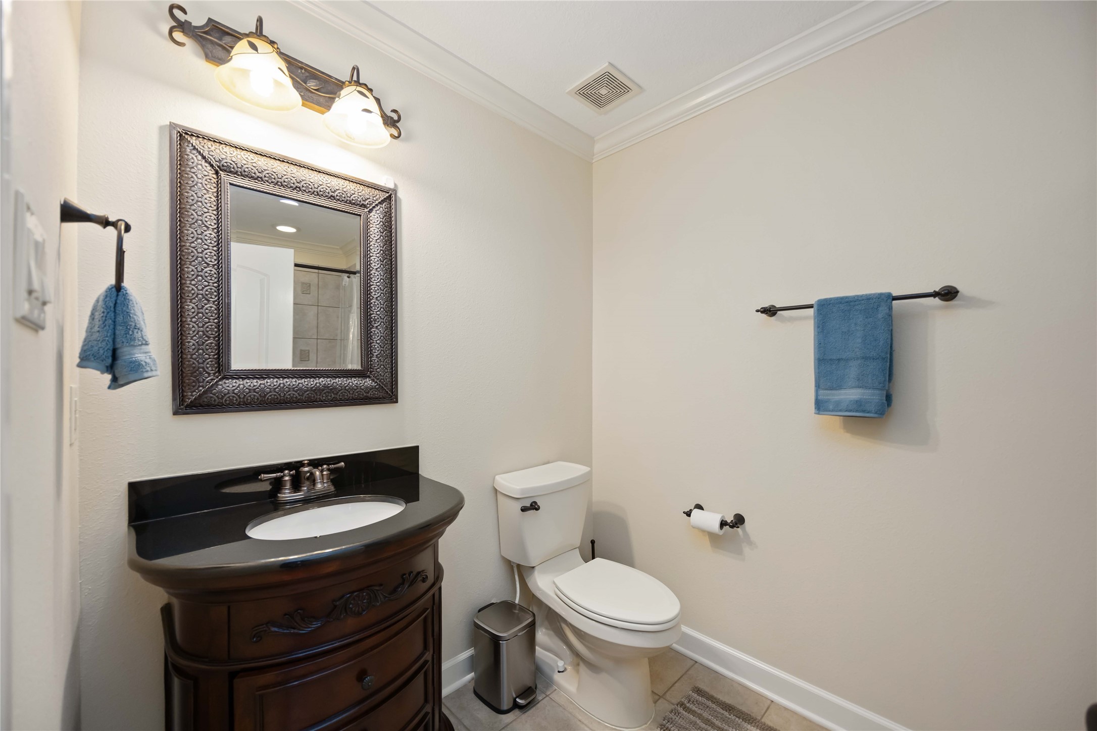 1809 St Beulah Chapel Road Montgomery, TX 77316 - Photo 32 of 50 a bathroom with a sink a toilet and mirror