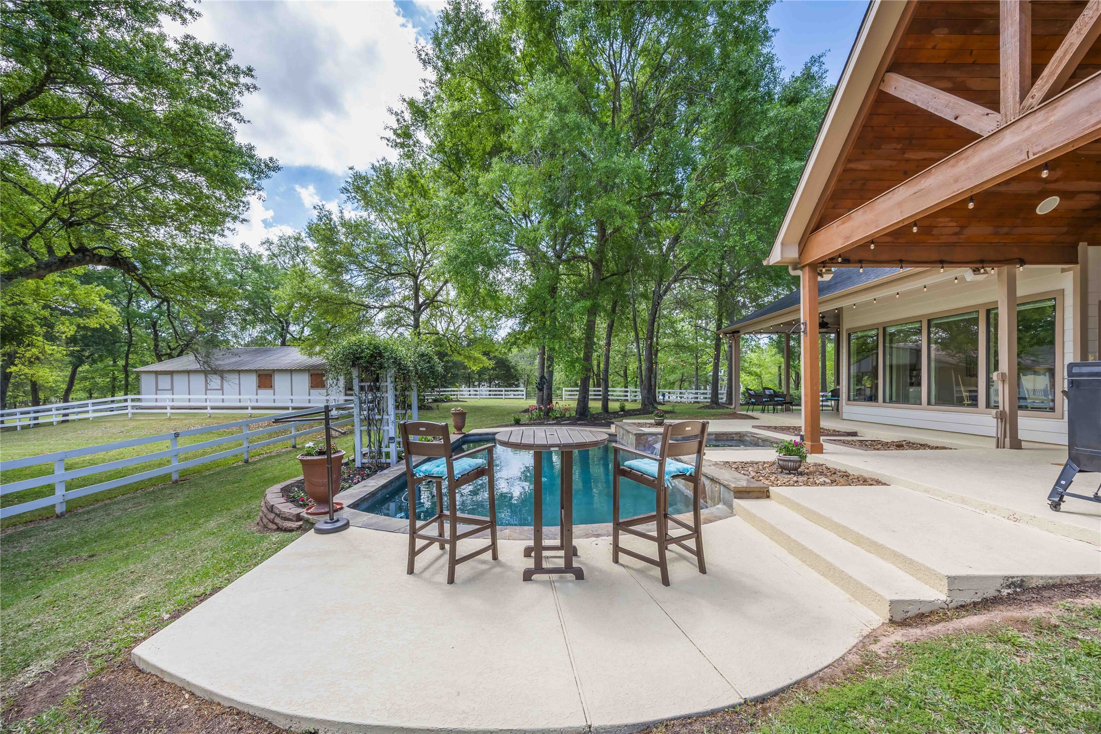 1809 St Beulah Chapel Road Montgomery, TX 77316 - Photo 38 of 50 a view of a house with backyard sitting area and garden