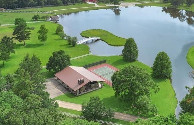 1809 St Beulah Chapel Road Montgomery, TX 77316 - Photo 49 of 50 an aerial view of a house with a swimming pool outdoor seating and yard
