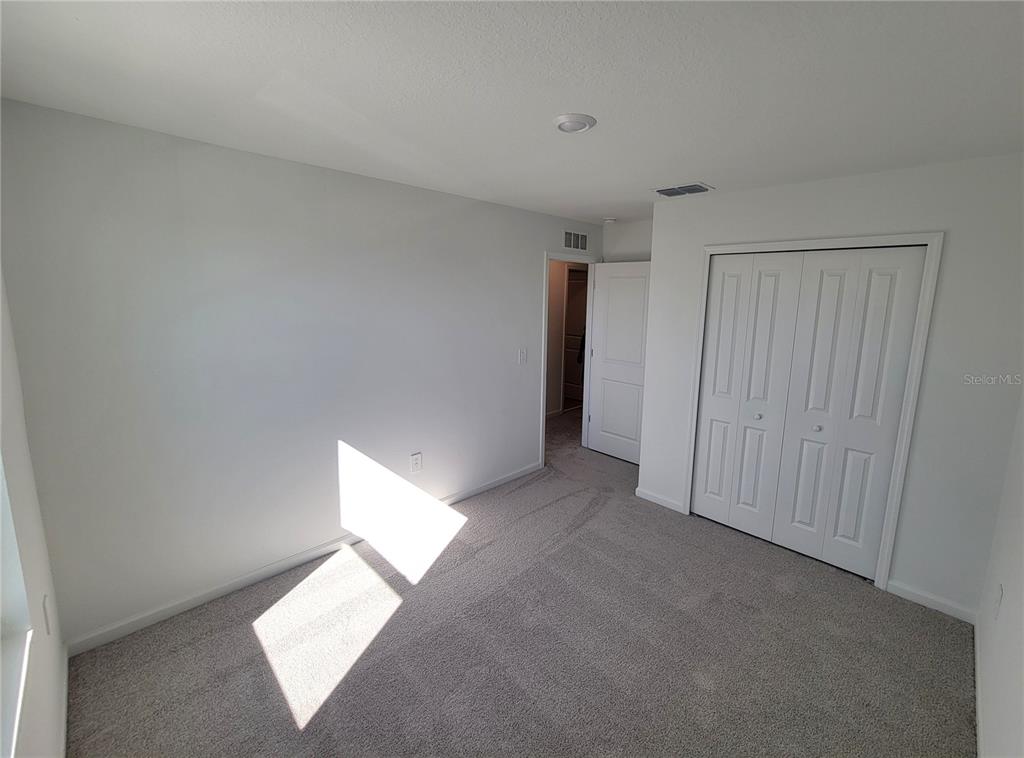 3147 Totem Road Eagle Lake, FL 33839 - Photo 14 of 18 a view of an empty room and a window