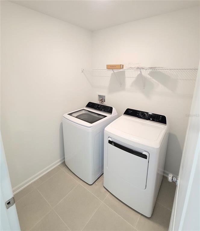 3147 Totem Road Eagle Lake, FL 33839 - Photo 18 of 18 a utility room with dryer and washer