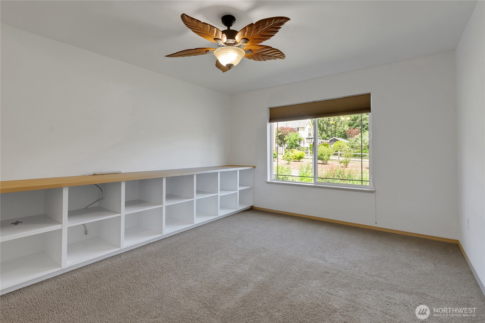 1450 Southeast Spruce Road Port Orchard, WA 98367 - Photo 25 of 39 an empty room with a window and a ceiling fan