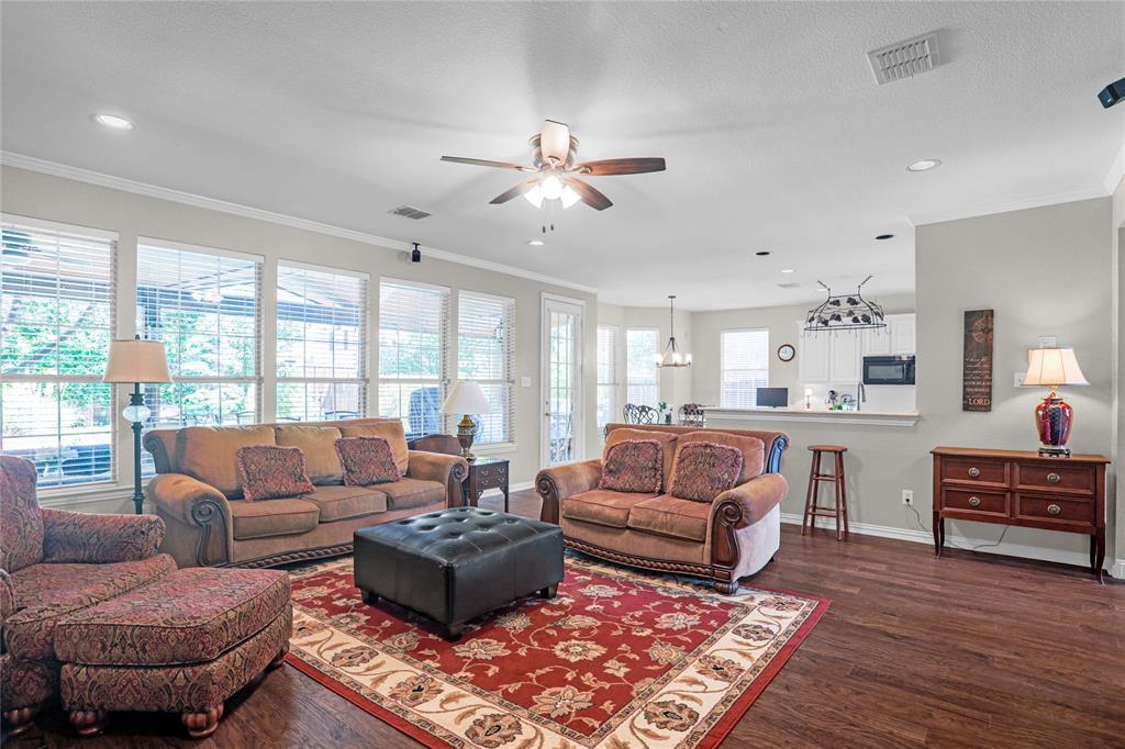 2017 Country Brook Lane Allen, TX 75002 - Photo 12 of 36 a living room with furniture and a large window