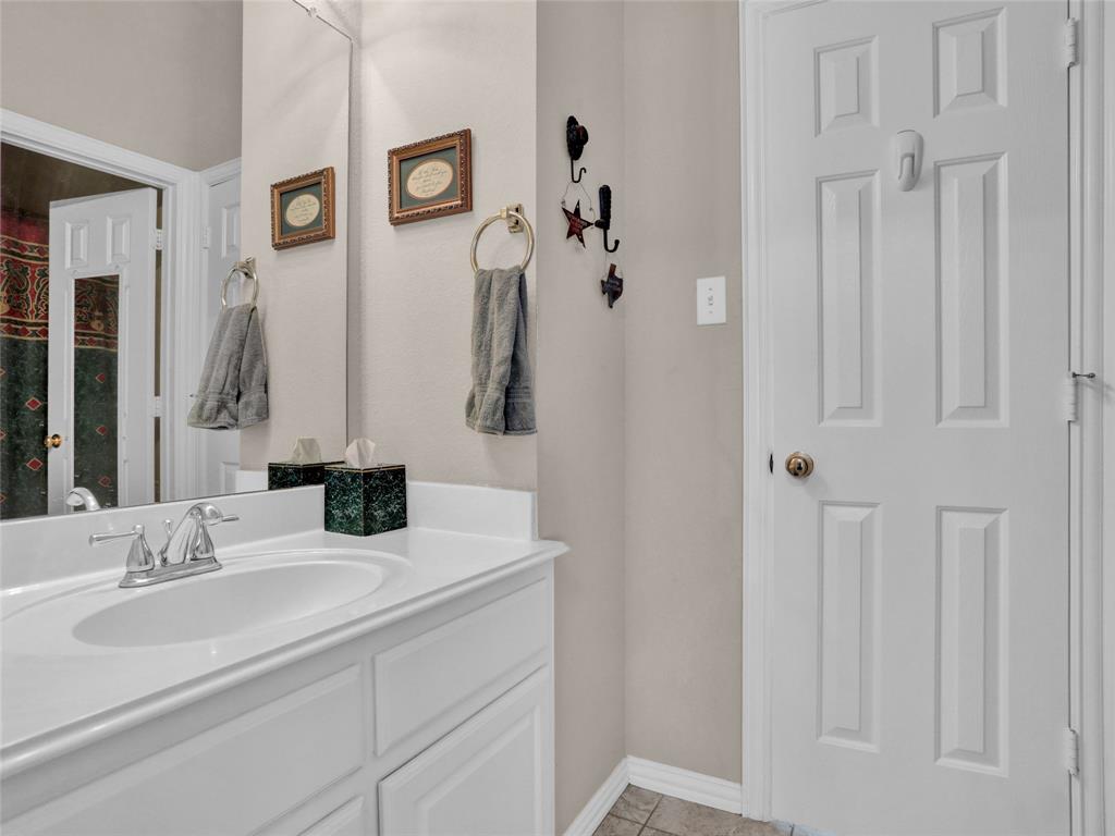 2017 Country Brook Lane Allen, TX 75002 - Photo 25 of 36 a bathroom with double vanity sink