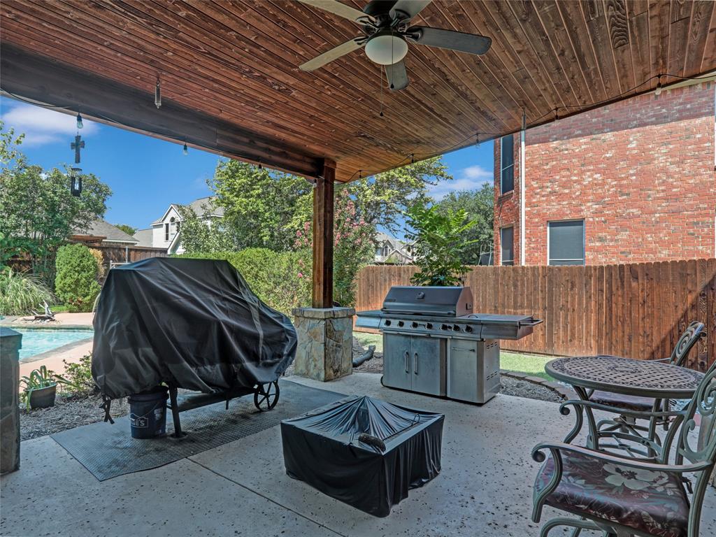 2017 Country Brook Lane Allen, TX 75002 - Photo 28 of 36 a view of patio with a table and chairs