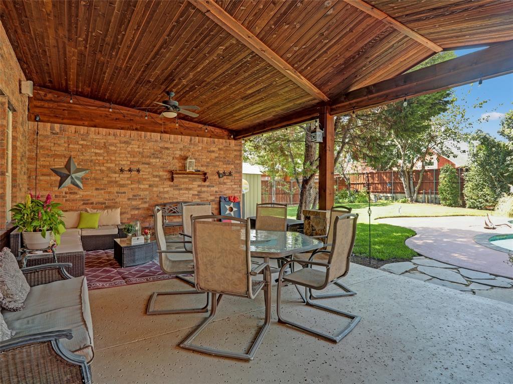 2017 Country Brook Lane Allen, TX 75002 - Photo 3 of 36 a view of a porch with furniture and yard