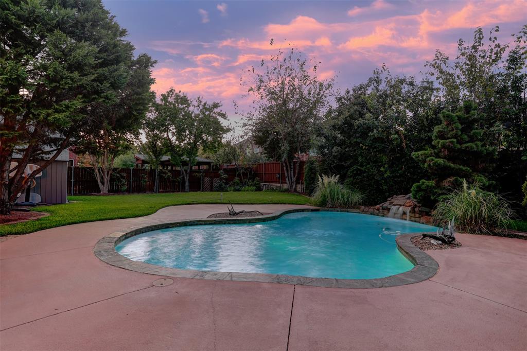 2017 Country Brook Lane Allen, TX 75002 - Photo 33 of 36 a view of a swimming pool with a yard