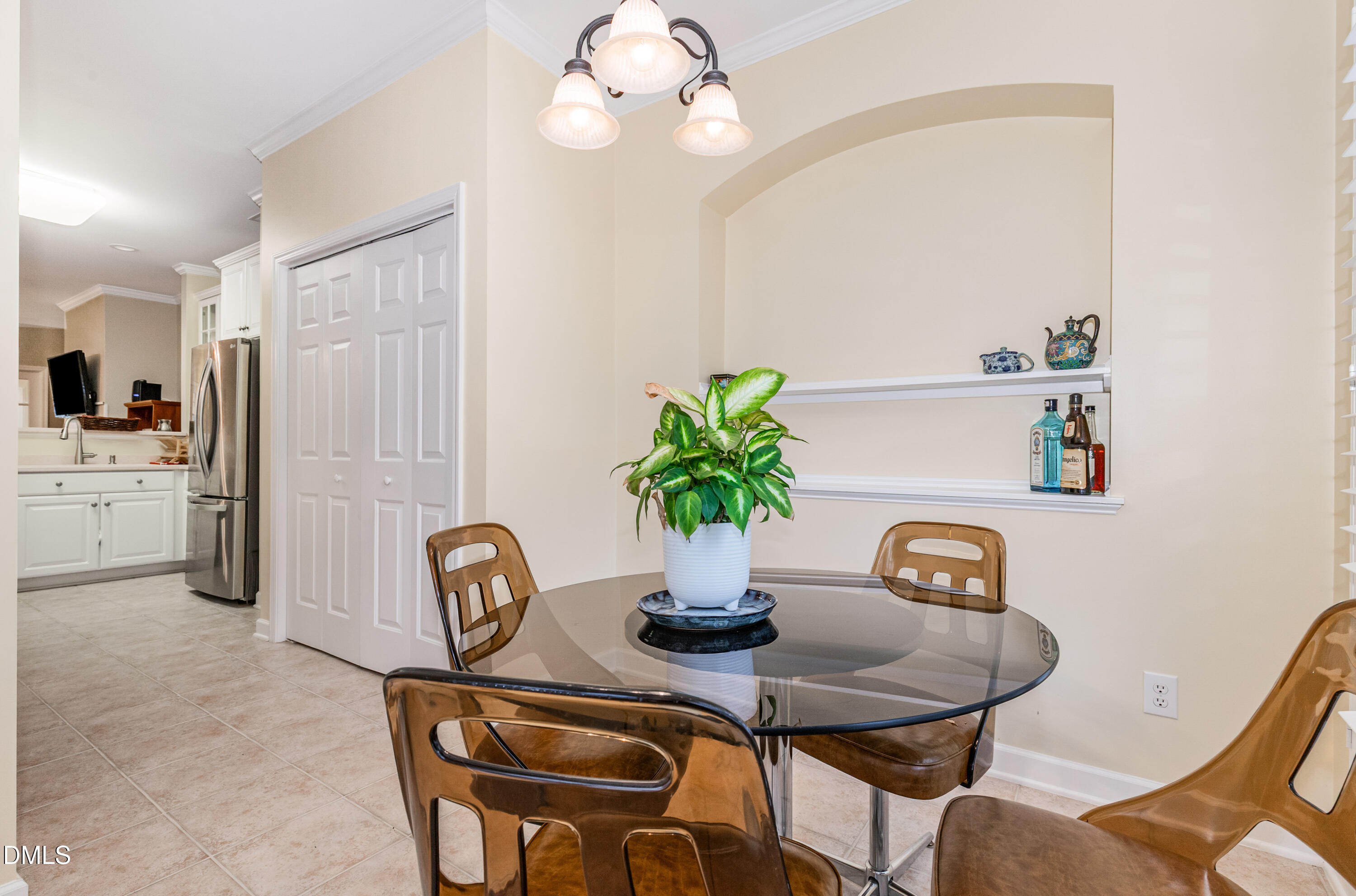 2541 Forest Shadows Lane Raleigh, NC 27614 - Photo 6 of 23 a view of a dining room with furniture and chandelier