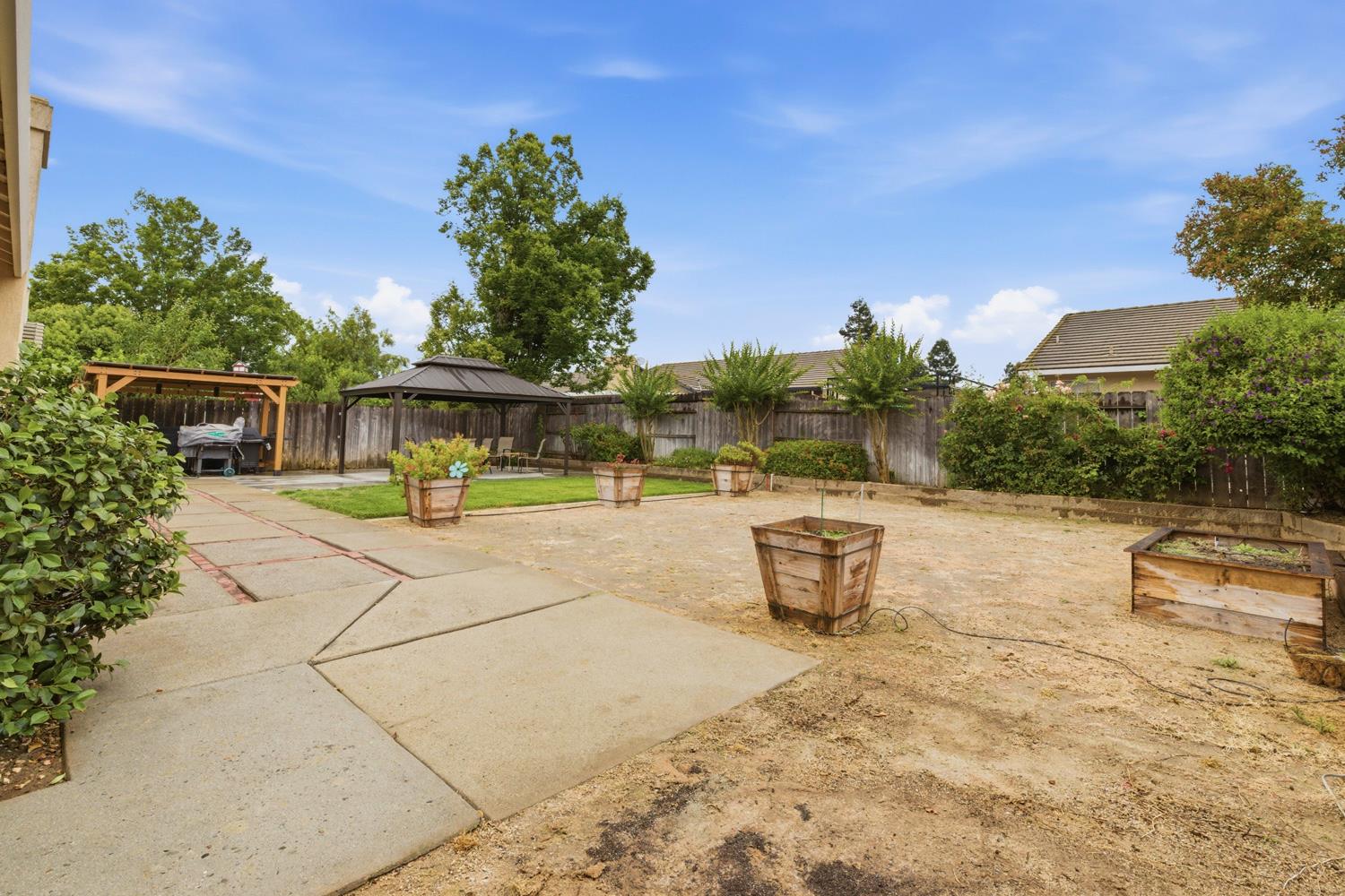 969 Colson Way Galt, CA 95632 - Photo 36 of 38 a view of a swimming pool with a patio