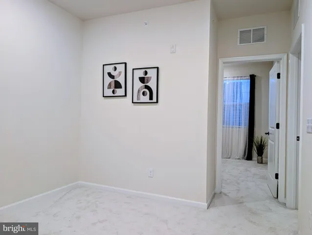 a view of a hallway with closet