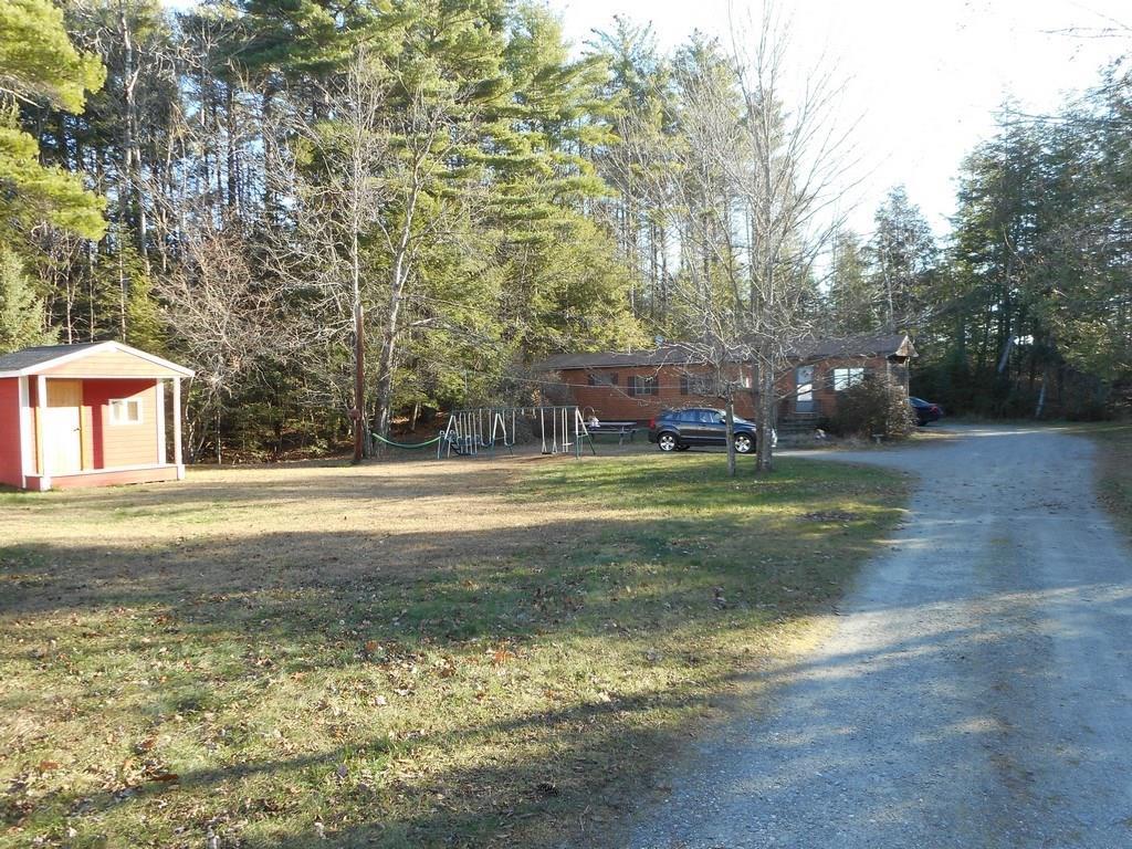 497 Main Road Milford, ME 04461 - Photo 25 of 35 View of play house and trailer.